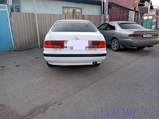 Toyota Carina E    year Алматы - photo 3