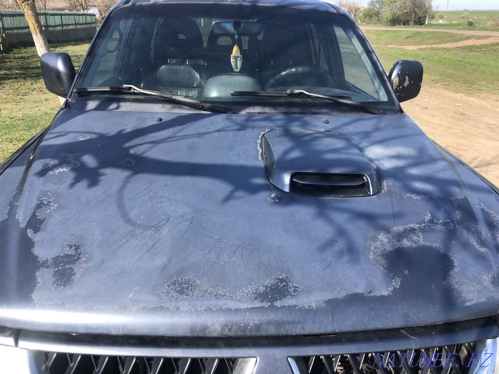 auto mitsubishi pejero sport  - photo 3