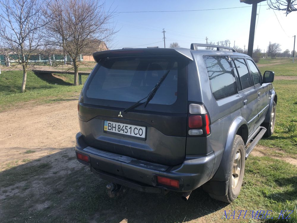 auto mitsubishi pejero sport  - photo 1