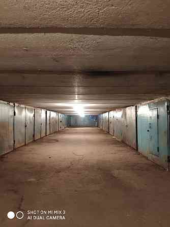 Подземный гараж Муканова-Казыбек би  Алматы