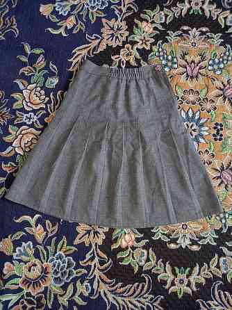 Продаётся школьная юбка серого цвета ,на возраст 7 -8-9лет Aqtau