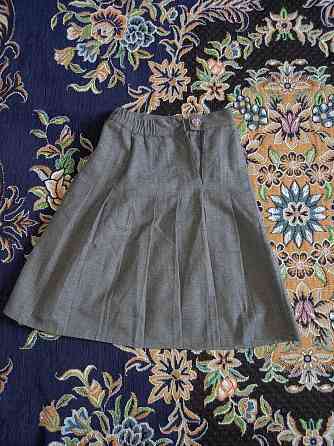 Продаётся школьная юбка серого цвета ,на возраст 7 -8-9лет Актау