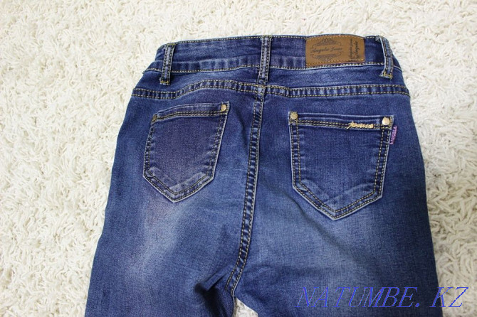 Teenage jeans for girls Rudnyy - photo 2