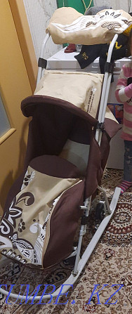 Selling a sled stroller. Мичуринское - photo 1