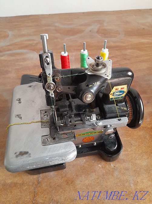 Швейная оверловочная машинка. Боралдай - изображение 3