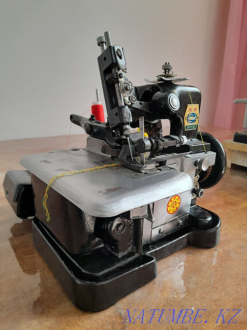 Швейная оверловочная машинка. Боралдай - изображение 2