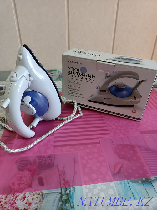 Iron compact Нуркен - photo 4