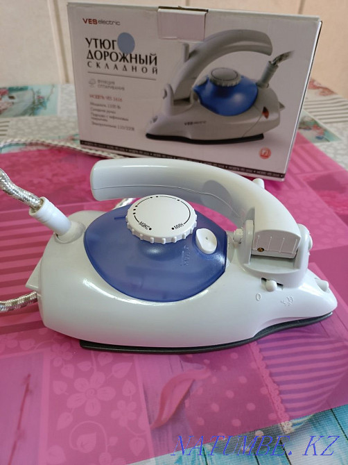 Iron compact Нуркен - photo 2