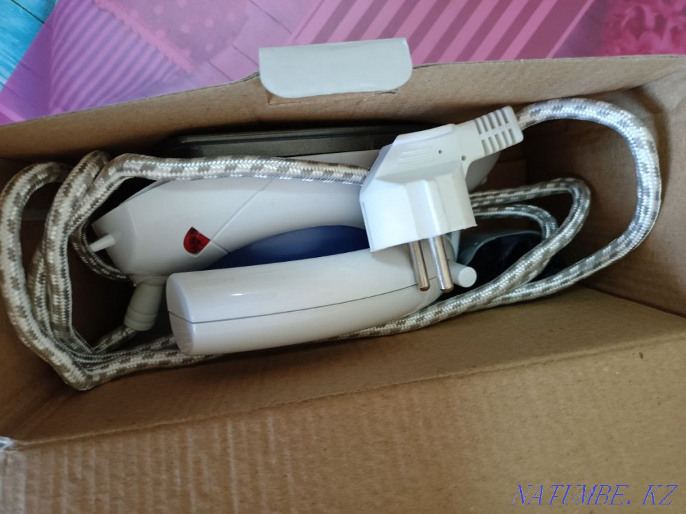 Iron compact Нуркен - photo 1