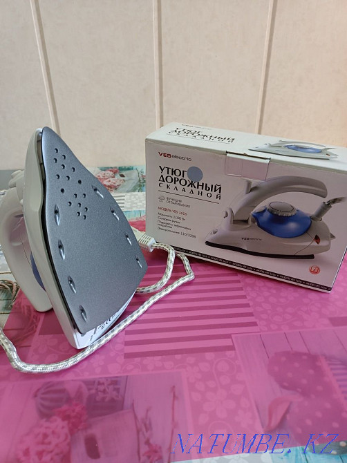 Iron compact Нуркен - photo 3