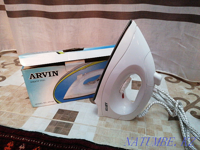 I will sell a new iron cheaply  - photo 1