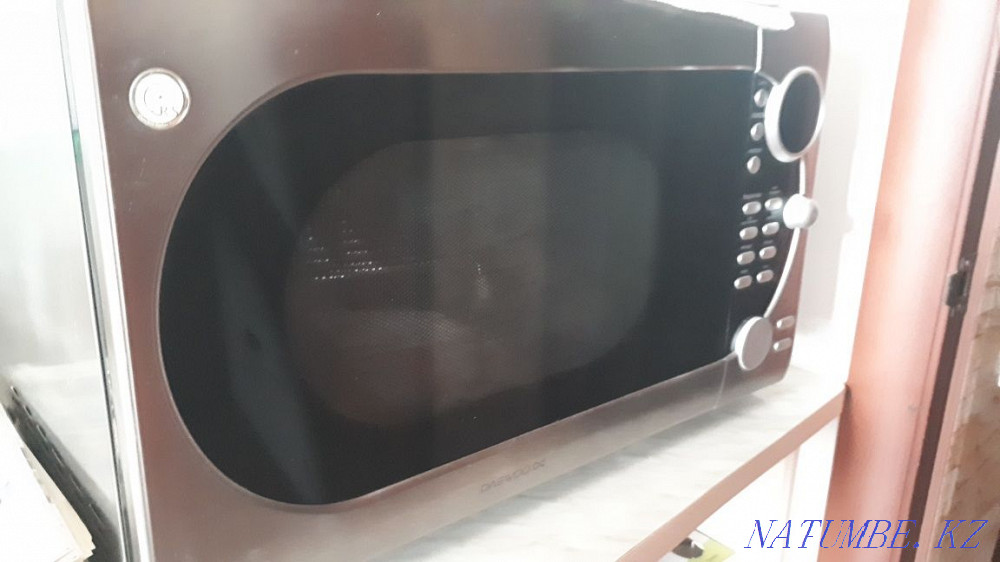 Микроволновка новая фирмы Daewoo  - изображение 1