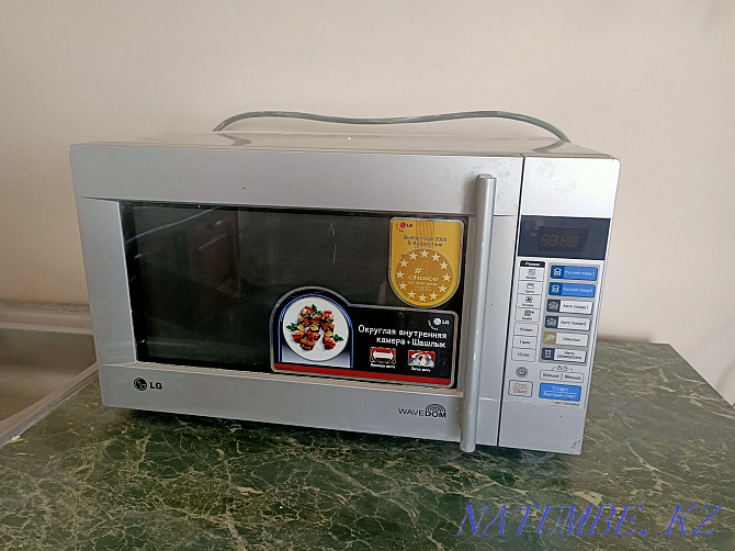Large microwave oven with grill. Astana - photo 1