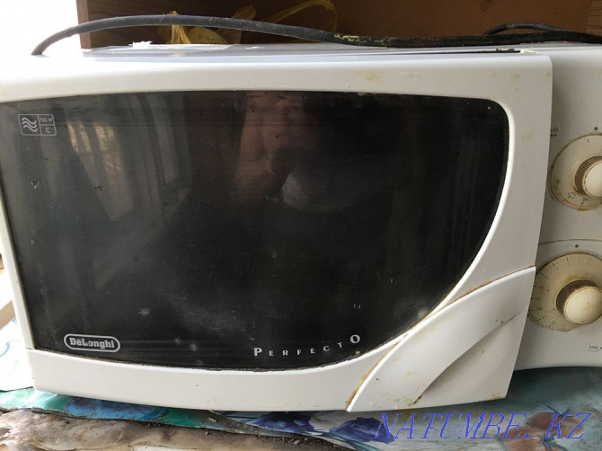 Delonghi microwave oven for sale. With grill. Pavlodar - photo 1