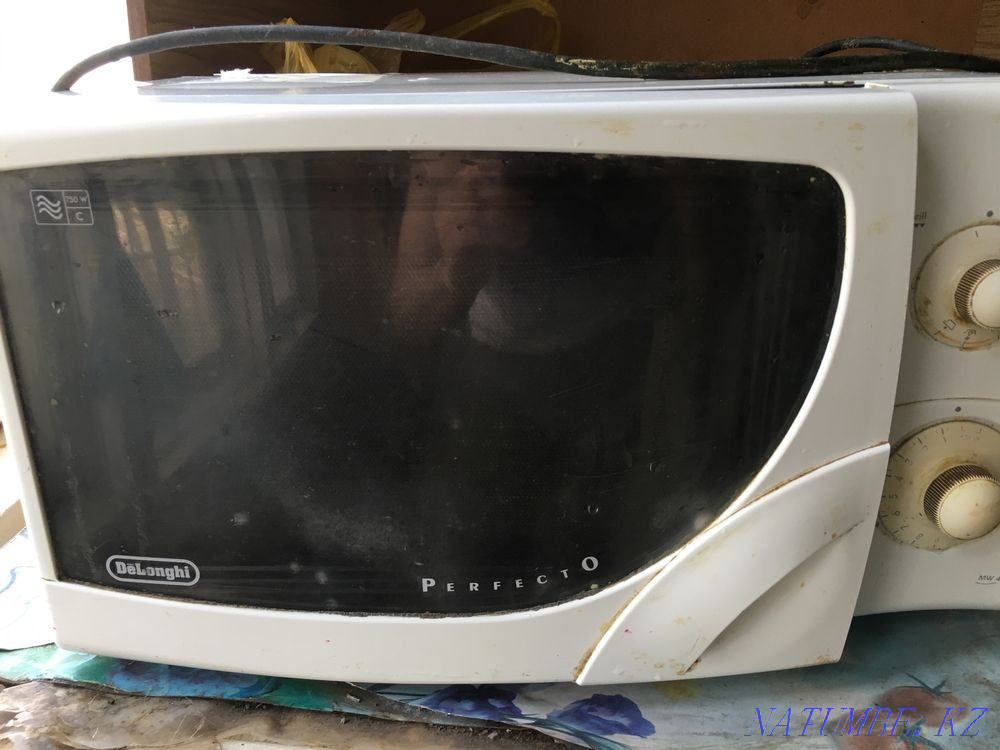 Продам микроволновку Delonghi. C грилем. Павлодар - изображение 1