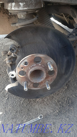 Offsite mobile tire service. Unscrew the torn bolt and lock nut Astana - photo 5