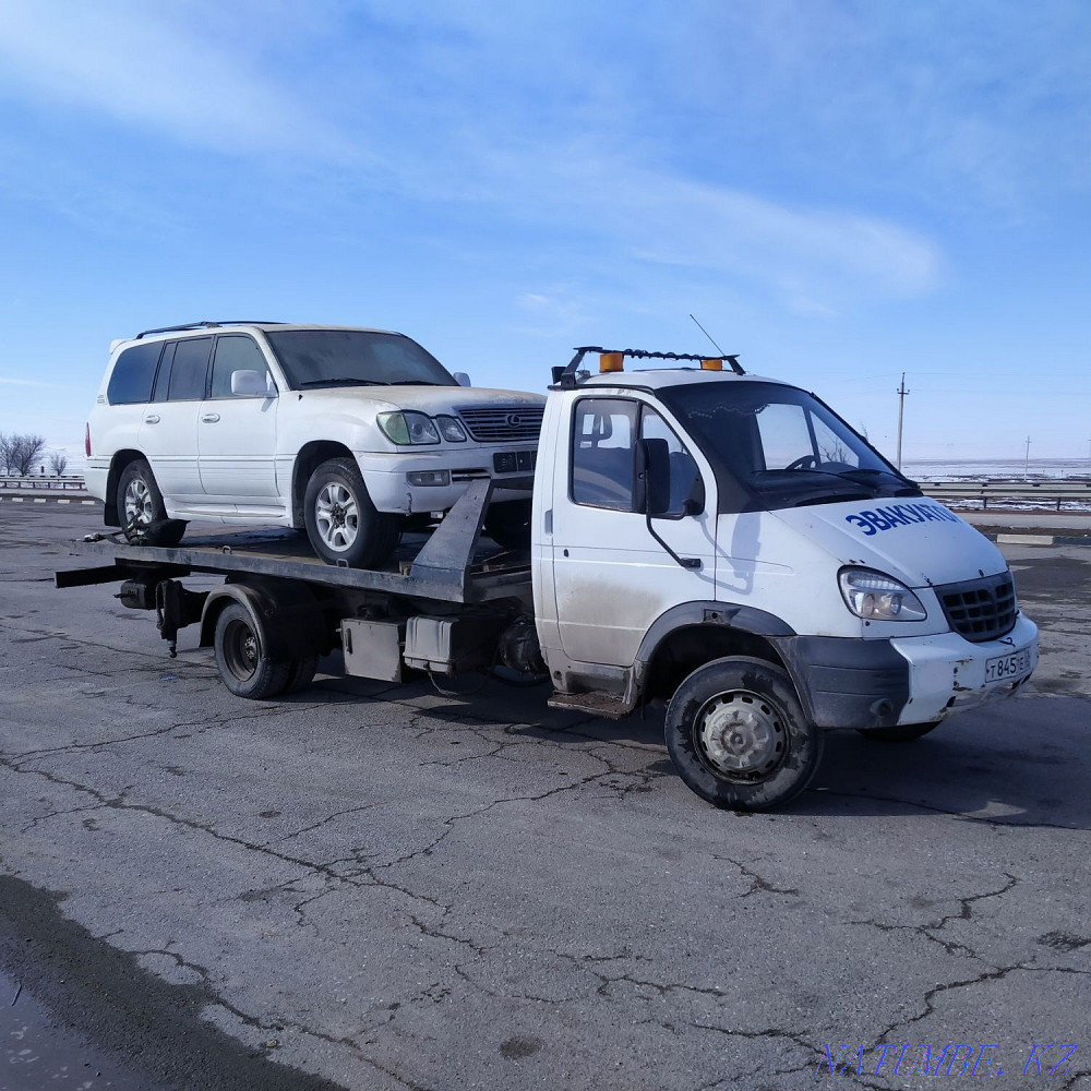 Tow truck for transporting cars around the city between cities cheaply Taraz - photo 1