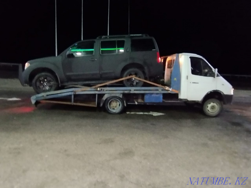 услуги эвакуатора Каскелен - изображение 1