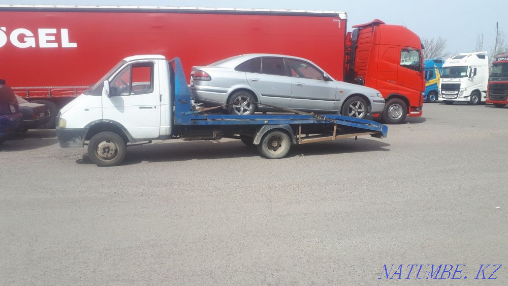 услуги эвакуатора Каскелен - изображение 2