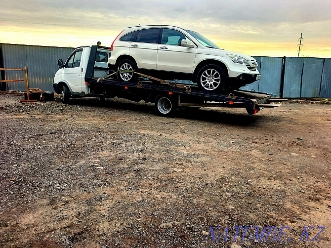 Tow truck. Tow truck services are not expensive in Karaganda and the region Karagandy - photo 5