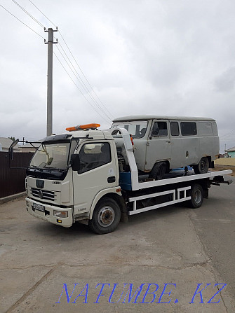 Tow truck Atyrau in the city and districts Балыкши - photo 1