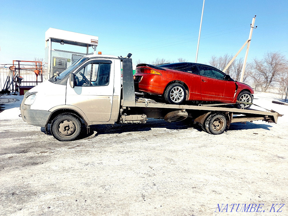 Tow truck services Karaganda 24/7 Southeast Maikuduk Prishakhtinsk ZhBI Karagandy - photo 1