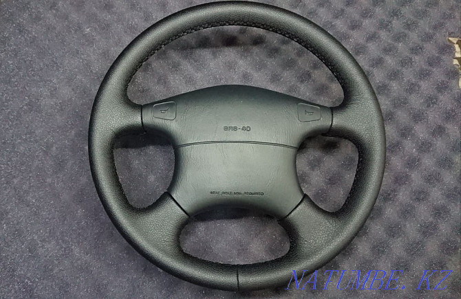 Steering wheel upholstery in leather, eco-leather. Padding of casings and gearshift knobs. Karagandy - photo 4