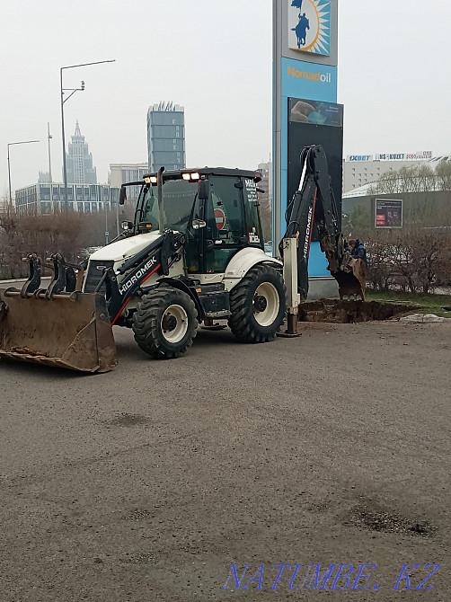 Услуги экскаватора-погрузчика, 3 в 1, петушок, ЖСБ, САТ, молот, вилы. Тельмана - изображение 1