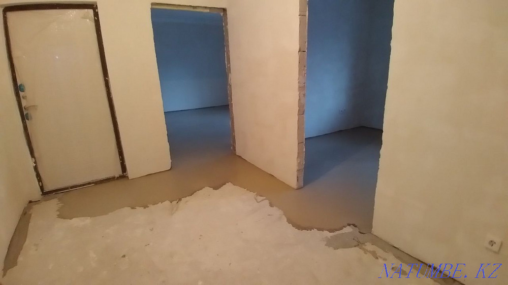 Laying laminate, pouring the floor, installing the plinth. Astana - photo 6