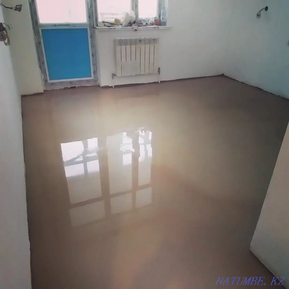 Laying laminate, pouring the floor, installing the plinth. Astana - photo 3