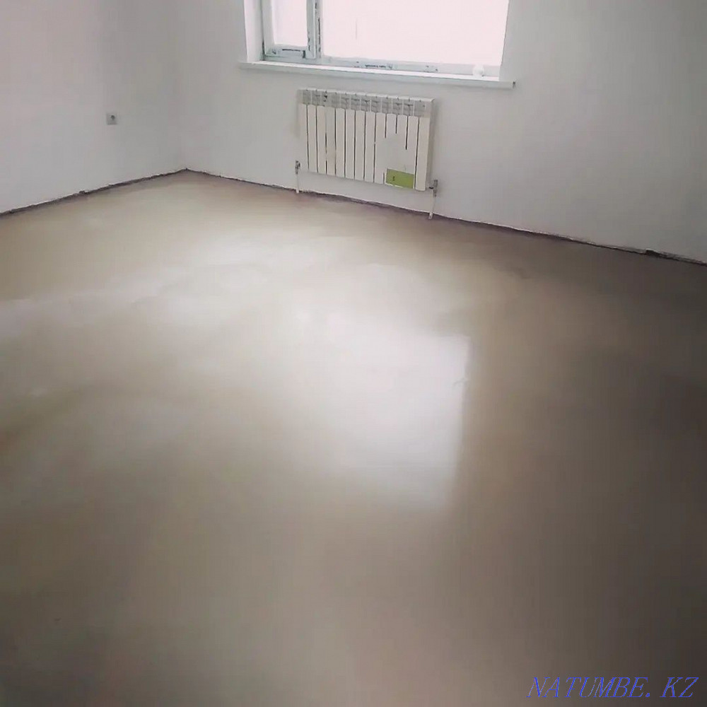 Laying laminate, pouring the floor, installing the plinth. Astana - photo 4