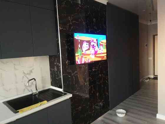 Установка телевизора на стену настенный кронштейн для тв Astana