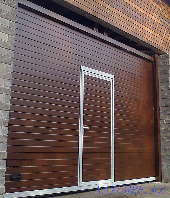Repair of sectional garage doors Белоярка - photo 1
