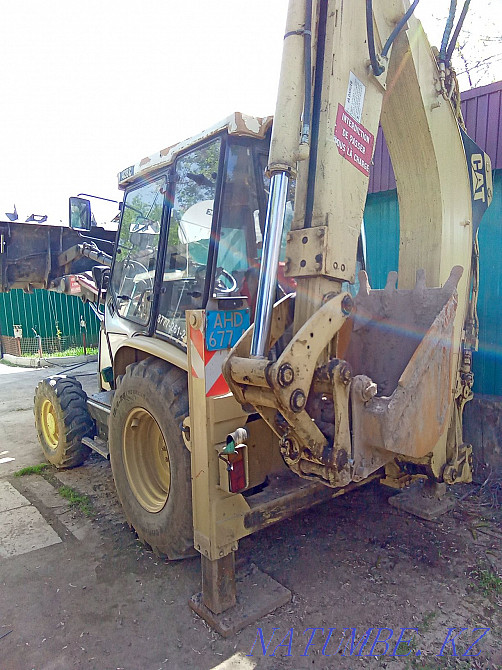 Services of the CAT-428C excavator loader. 3/1 Almaty - photo 1