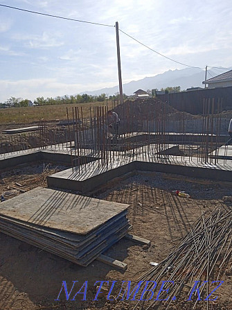 Bays foundation concrete team of builders with their formwork pouring Almaty - photo 3