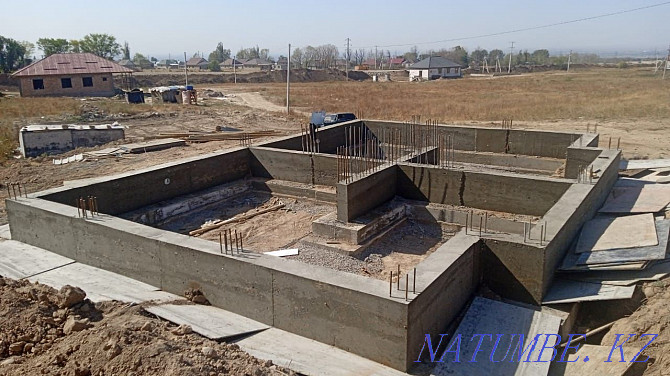 Bays foundation concrete team of builders with their formwork pouring Almaty - photo 4