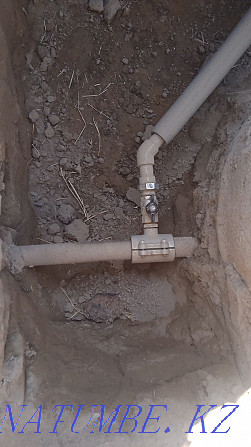 Digging a septic tank with trenches connecting to the central water supply. Sewerage Almaty - photo 3