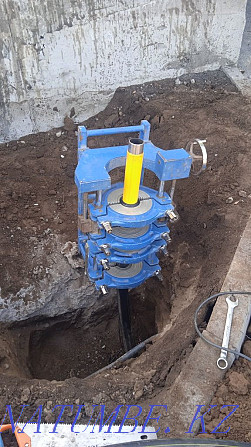 Digging a septic tank with trenches connecting to the central water supply. Sewerage Almaty - photo 2