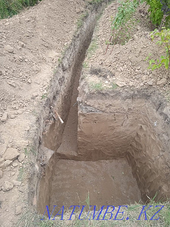 Digging a septic tank with trenches connecting to the central water supply. Sewerage Almaty - photo 4