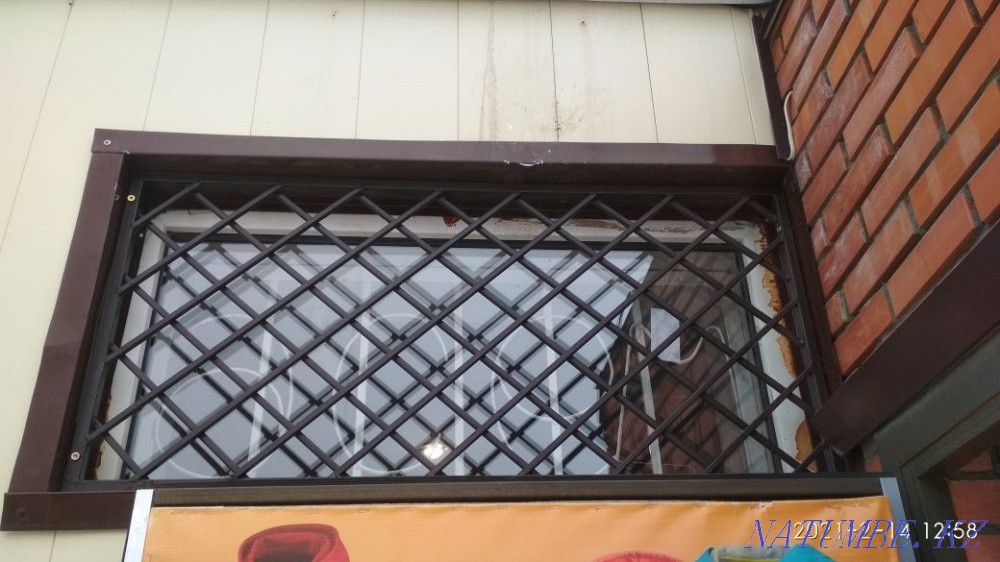 Lattices on windows, fences, gates. Rudnyy - photo 7