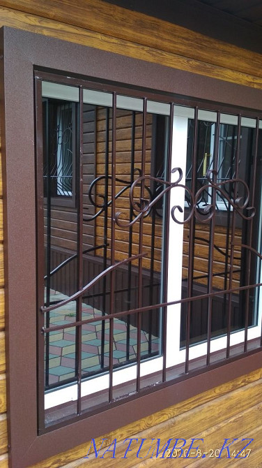 Lattices on windows, fences, gates. Rudnyy - photo 2