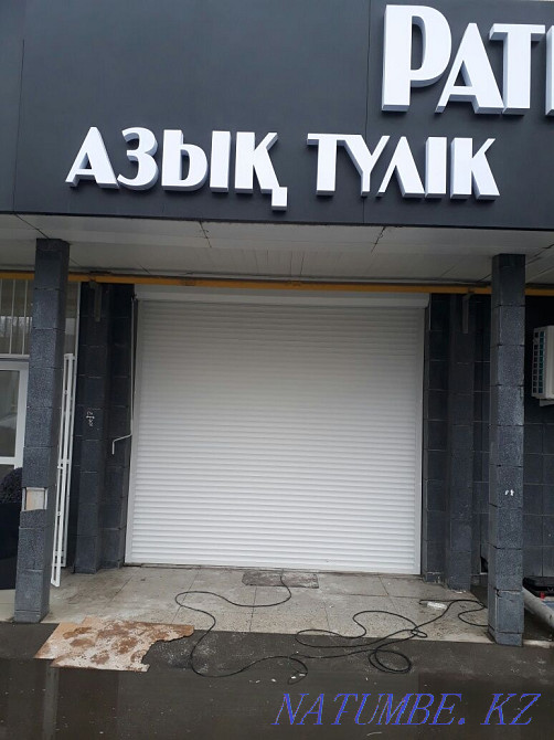 Repair, installation of sectional shutters, automation, barriers, Almaty - photo 1