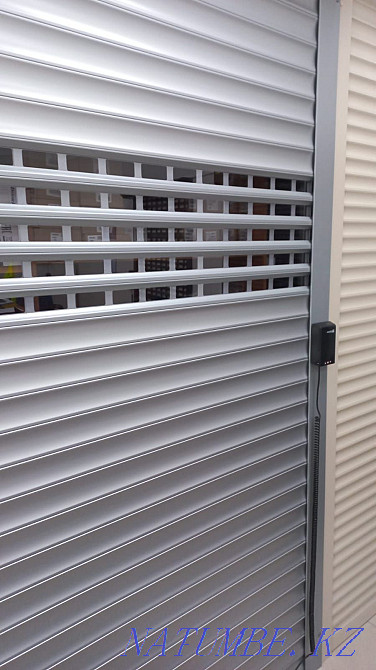 Sectional doors and rolling shutters and shutters. Karagandy - photo 3