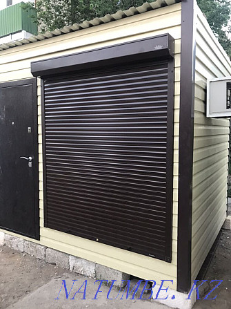 Sectional doors and roller shutters. Sale. Repair installation and dismantling Atyrau - photo 1