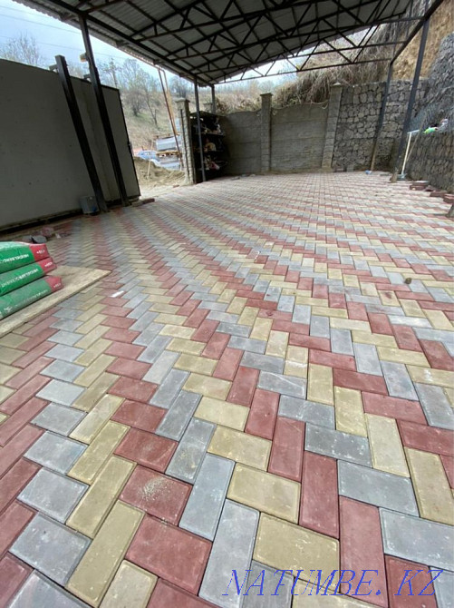 Laying of paving slabs, paving stones, installation of curbs Qaskeleng - photo 1
