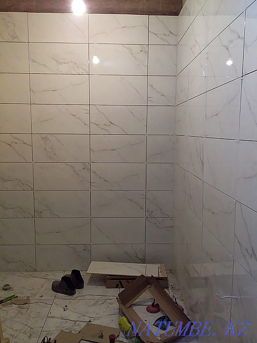 Free tiler, call any time. Payment can be made through Caspi RED Almaty - photo 1