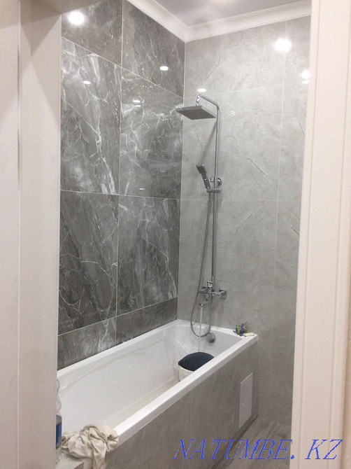 Laying tiles, turnkey sanitary units, high quality! Astana - photo 1