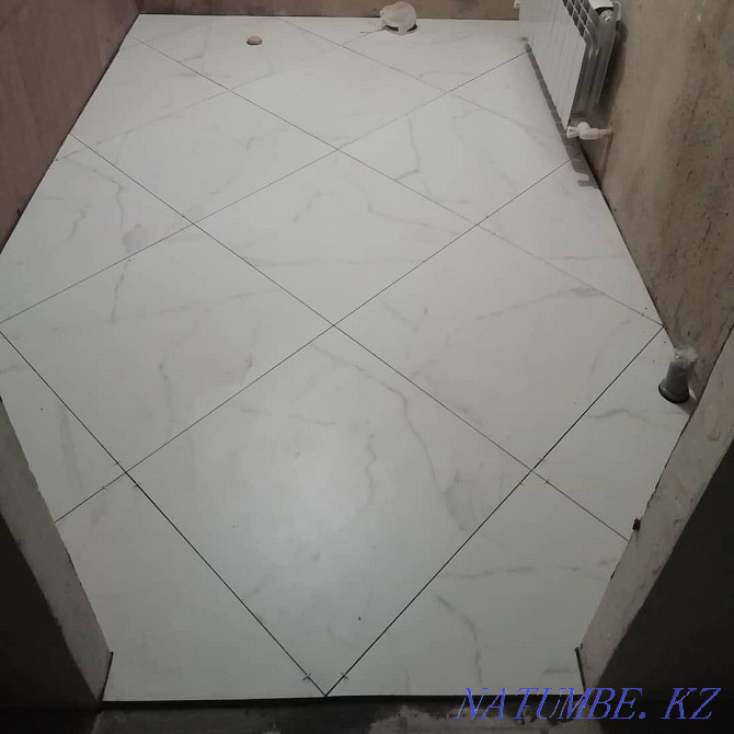 Laying tiles, Tiles, Porcelain tiles, Plumbing, installation of a toilet bowl, shower Almaty - photo 2