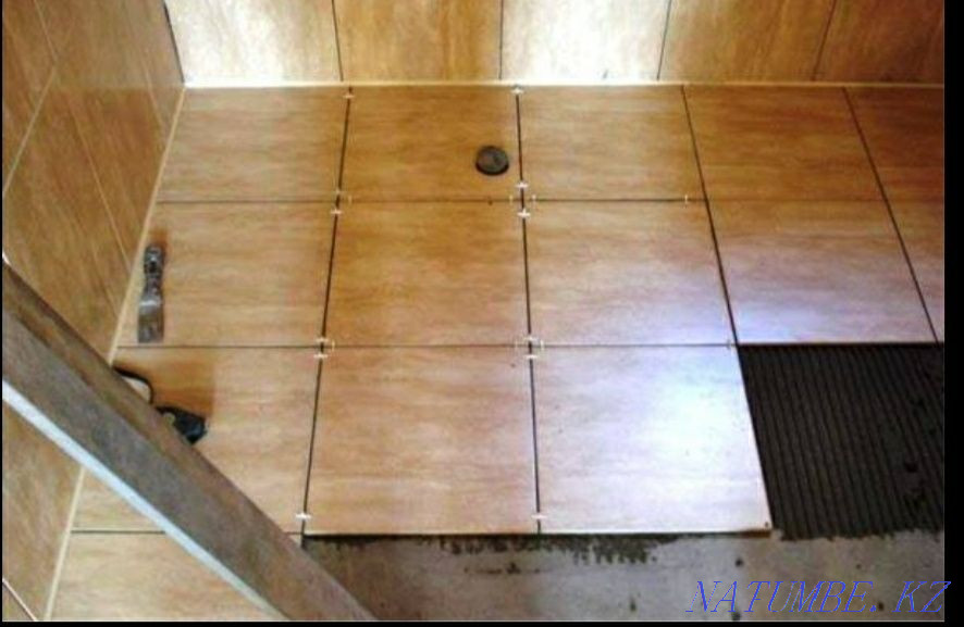 Laying tiles, porcelain stoneware Almaty - photo 1