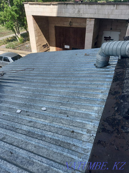 Roof workers and cleaning from snow and icicles Karagandy - photo 2
